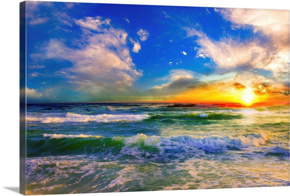 A blue ocean sunrise with white crested waves. A colorful seascape sunset with an orange sun.