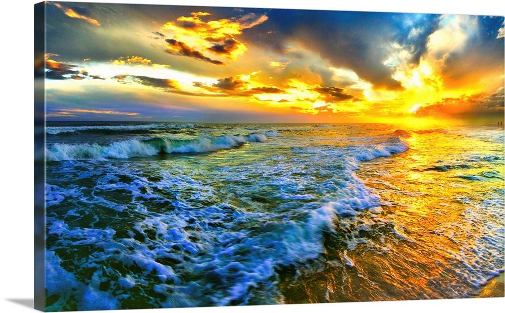 Golden Sunset Seascape crashing waves on a Florida beach. Landscape taken on Navarre Beach, Florida.