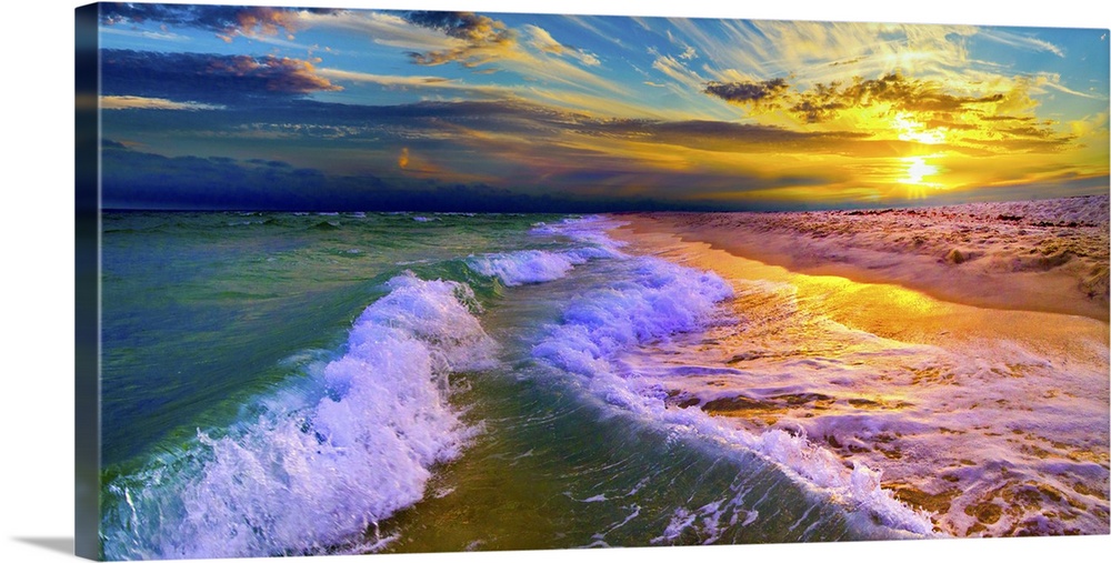 Ocean waves crash on the shore in this ocean sunset panorama with amazing clouds. This features breaking waves on a beauti...