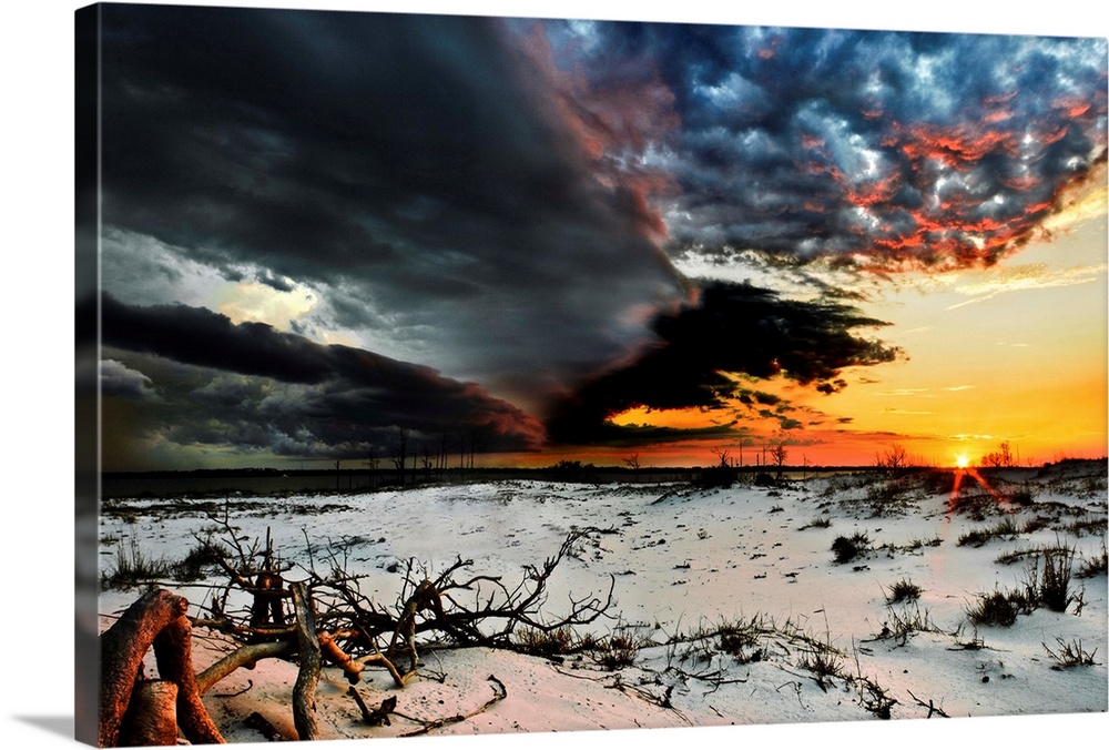 In this scene, colors war over dominance in the sky. Multi-colored lightning storm clouds roll in on a bright orange sunse...