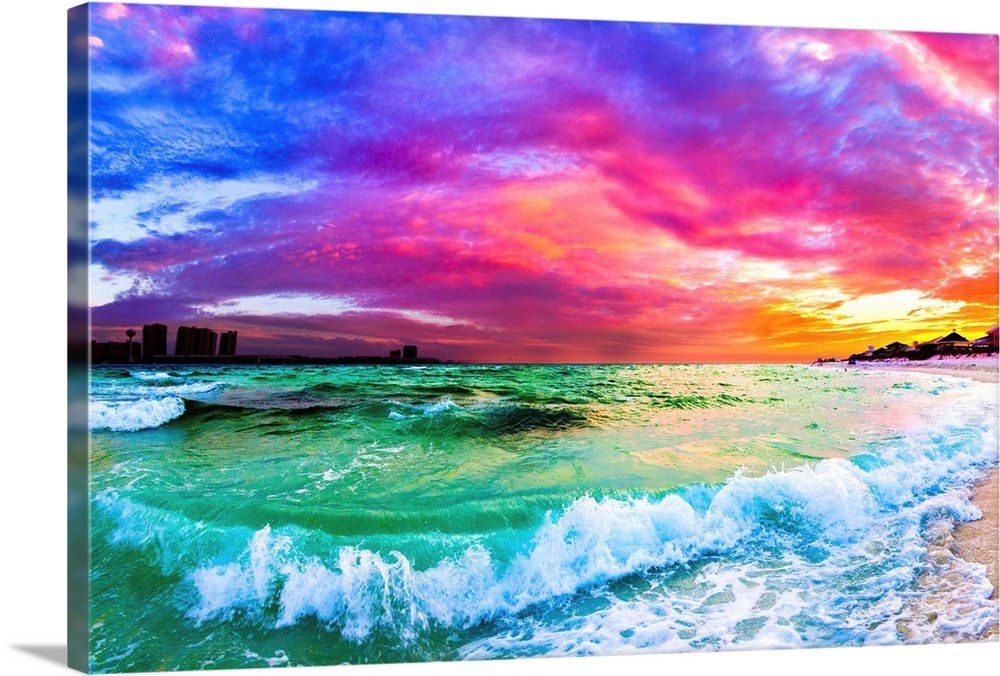 A purple and blue sunset with a rolling ocean wave in this beautiful seascape.
