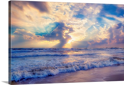 Red And Blue Cascading Waves On Sand At Sunset