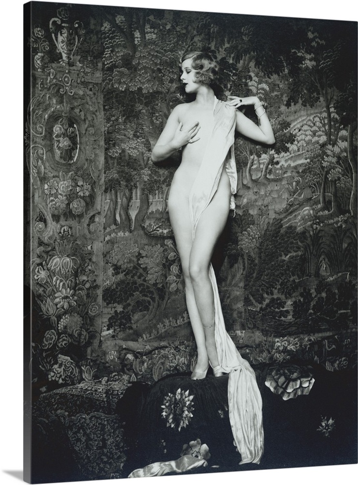 Actress, dancer, and Ziegfeld girl Hazel Forbes. Full length portrait of Forbes nude and draped in cloth in front of a tap...