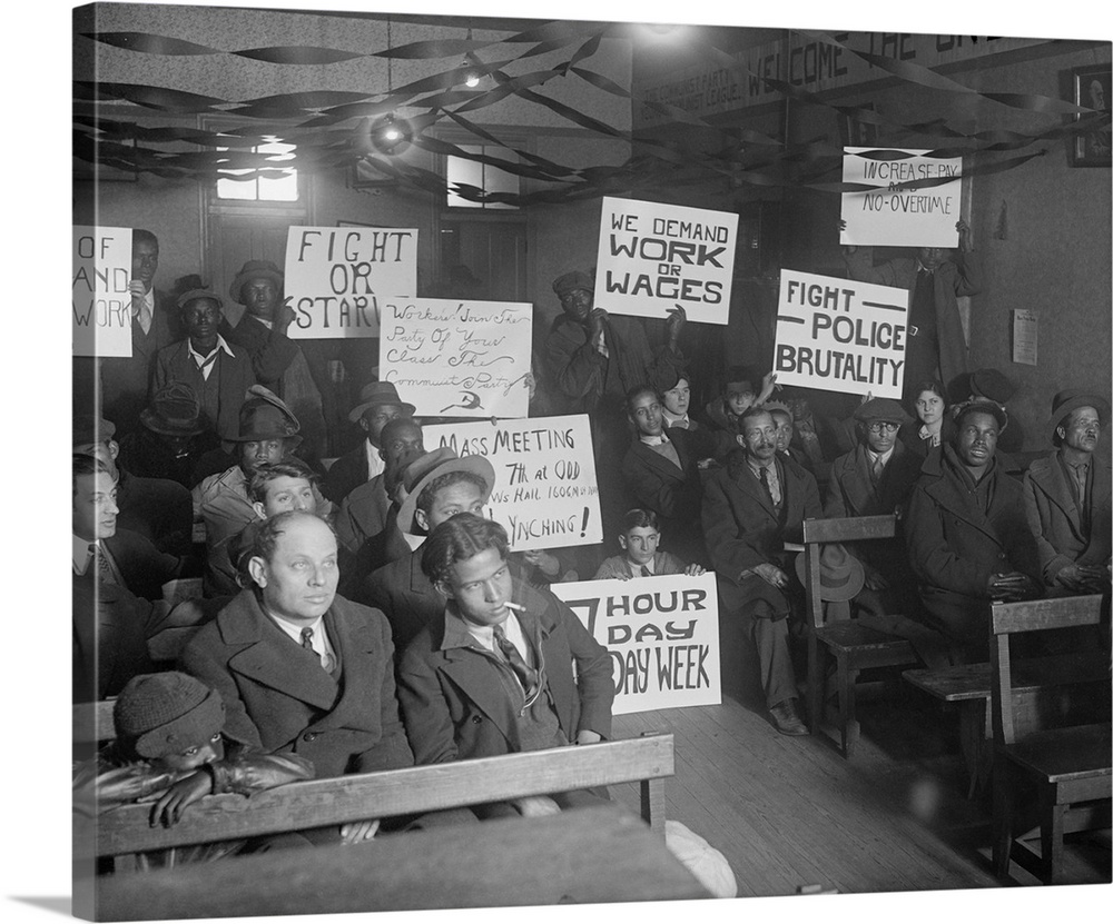 African Americans and Whites at a Communist meeting before a protest demonstration. Ca. 1919-1920. Signs displayed read: F...