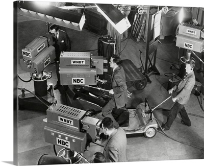 Cameras are tested on the television studio set before the program goes on the air,