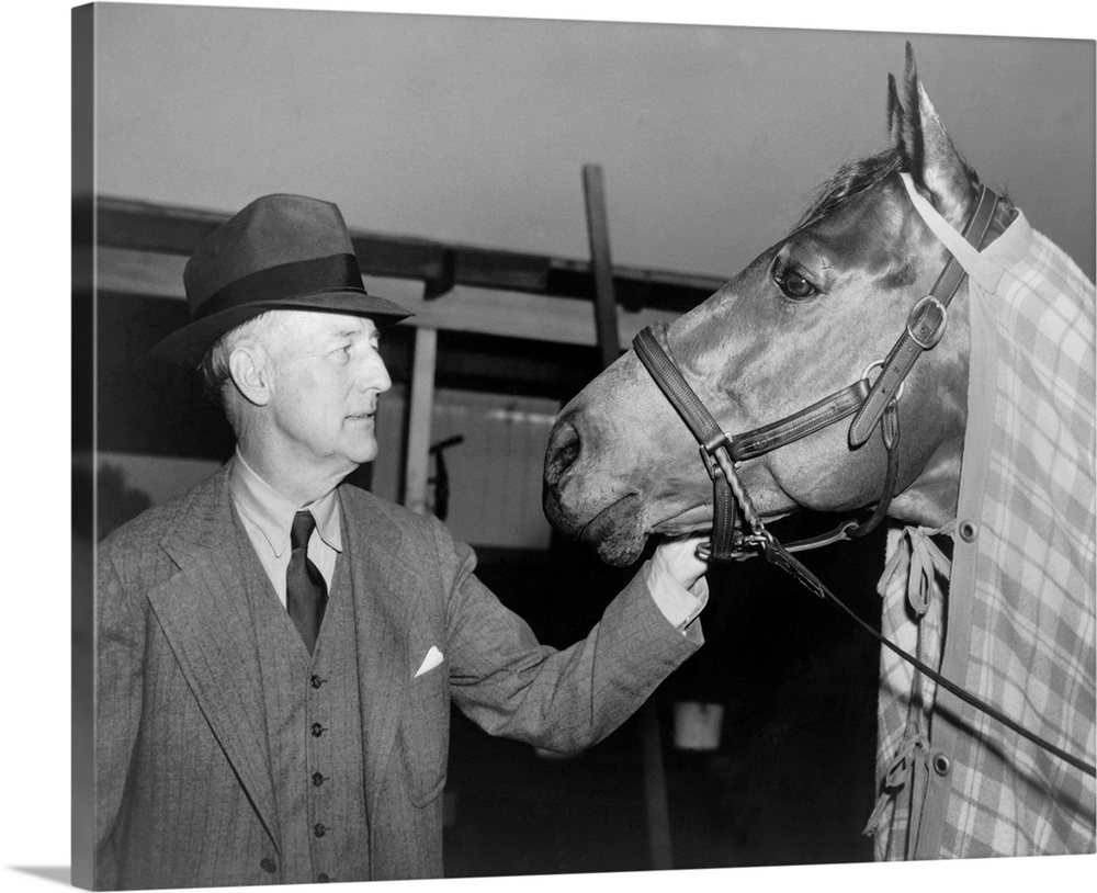 Charles Howard admiring his horse Seabiscuit, March 5, 1940. Seabiscuit had just won the Santa Anita Handicap.