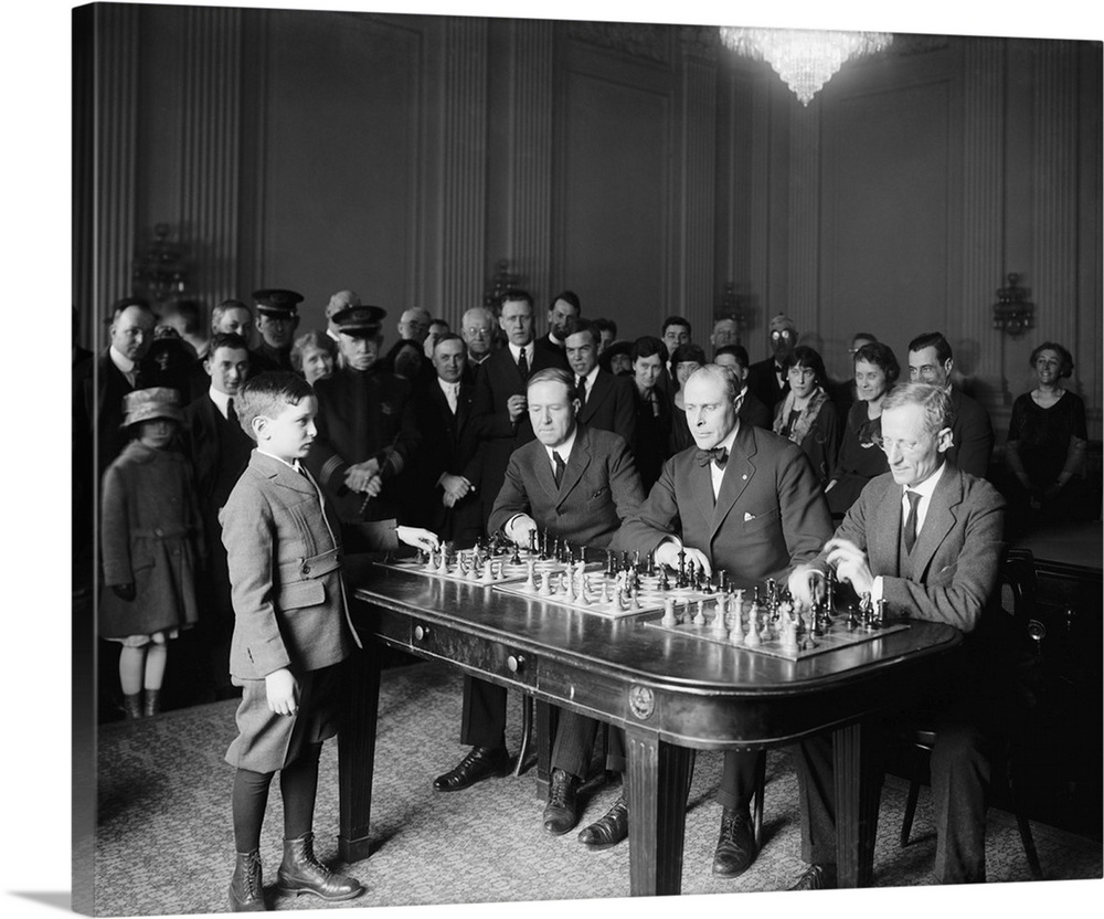 Chess prodigy, Samuel Herman Reshevsky, in a simultaneous chess exhibition match, April 6, 1922. The 10 year old was on an...