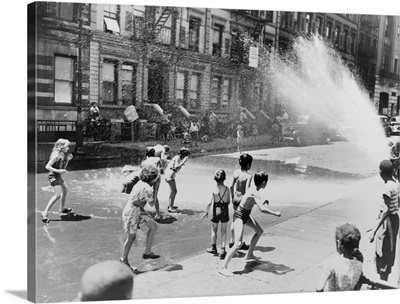 Children Escape Heat Of East Side By Opening Fire Hydrant. New York City, June 1943