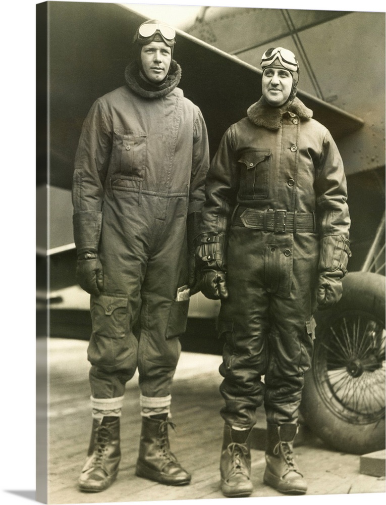 Col. Charles A. Lindbergh (left) and Harry F. Guggenheim in flight-suits. Dec. 8, 1928. The aviation pioneers took off fro...