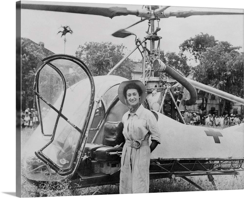 Dr. Valerie Andre, in front of her helicopter in Tonkin, Vietnam, in 1952. She served in the French army as a neurosurgeon...