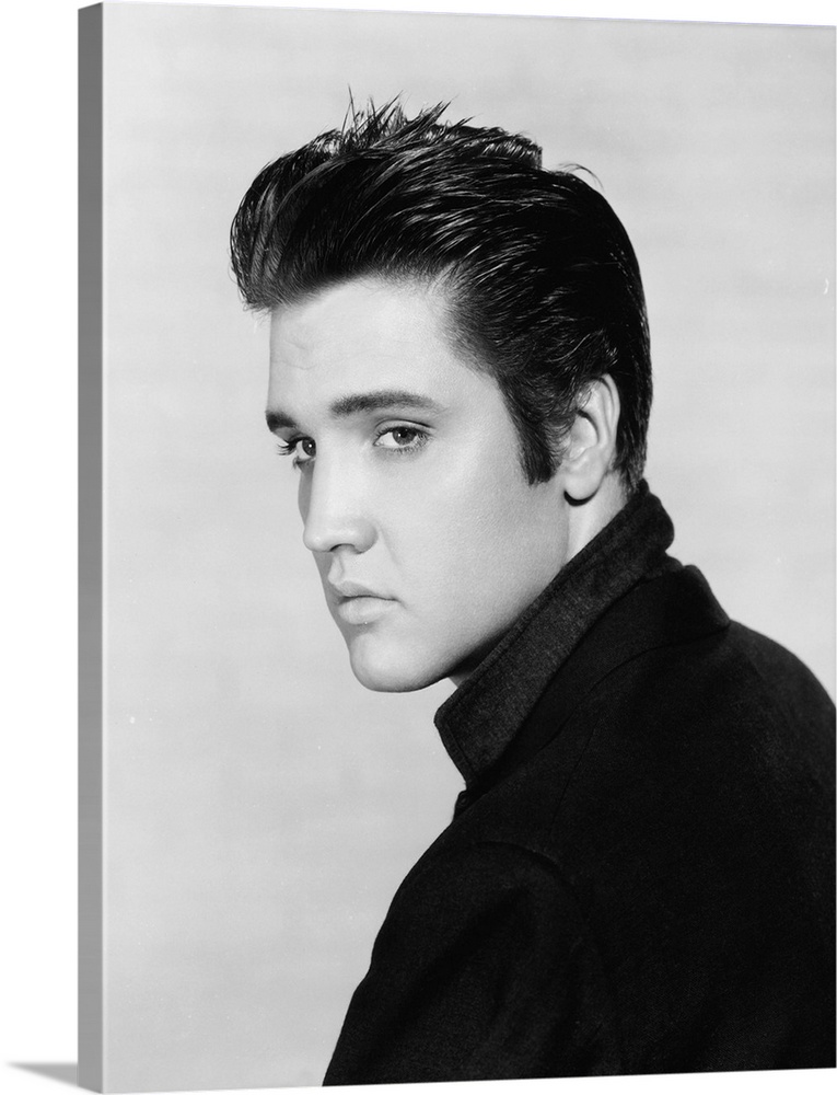 Black and white photograph of Elvis Presley.