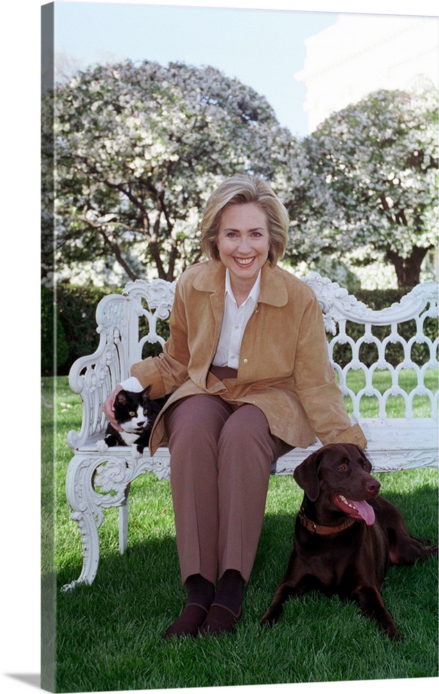 First Lady Hillary Rodham Clinton with Socks the Cat and Buddy the Dog on the White House Lawn. April 7, 1999.