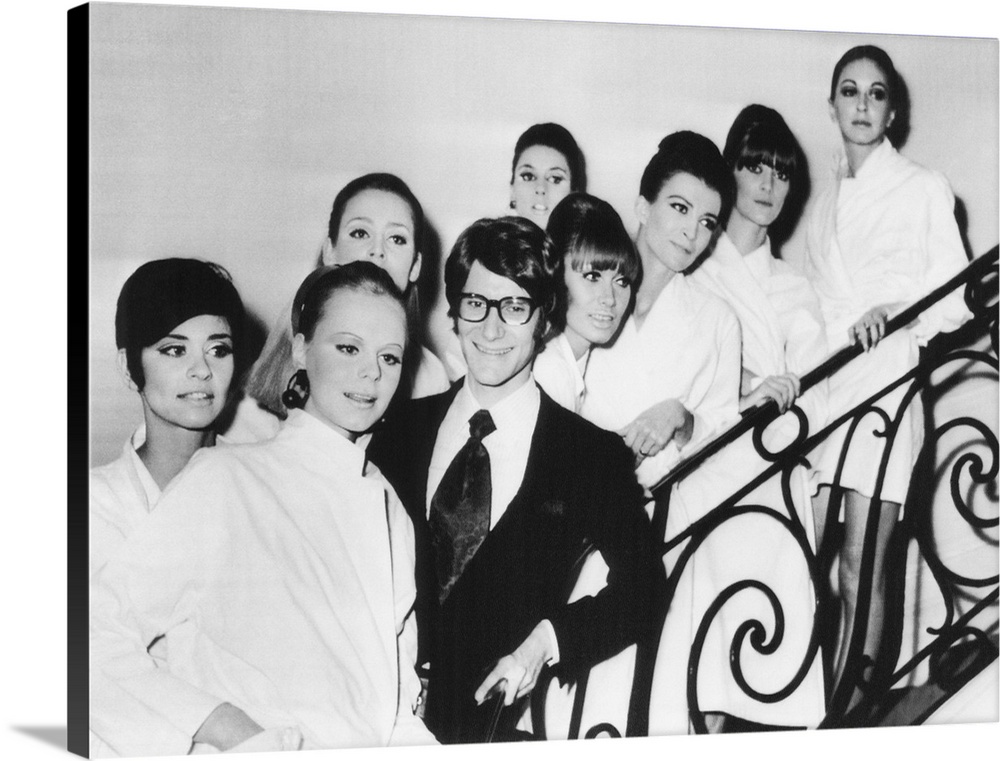 French fashion designer Yves Saint Laurent with models showing his 1967 spring summer collection. The models are made-up a...