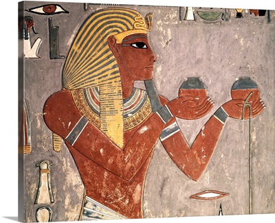 Horemheb offers two vessels of wine to the goddess Hathor. Egypt