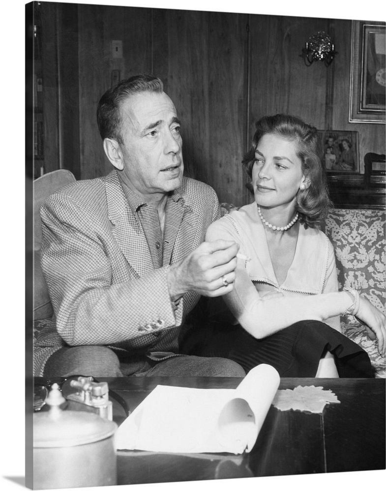 Humphrey Bogart and Lauren Bacall in their living room. May 1955.