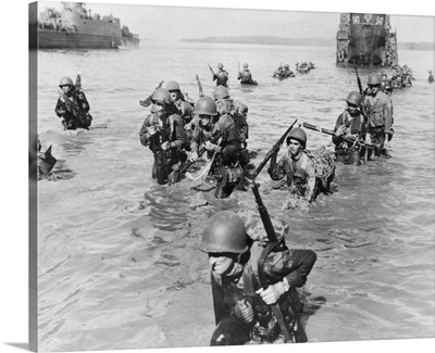 Infantrymen Wade Ashore In Neck-Deep Water From Their LCIs To Morotai Island Beach