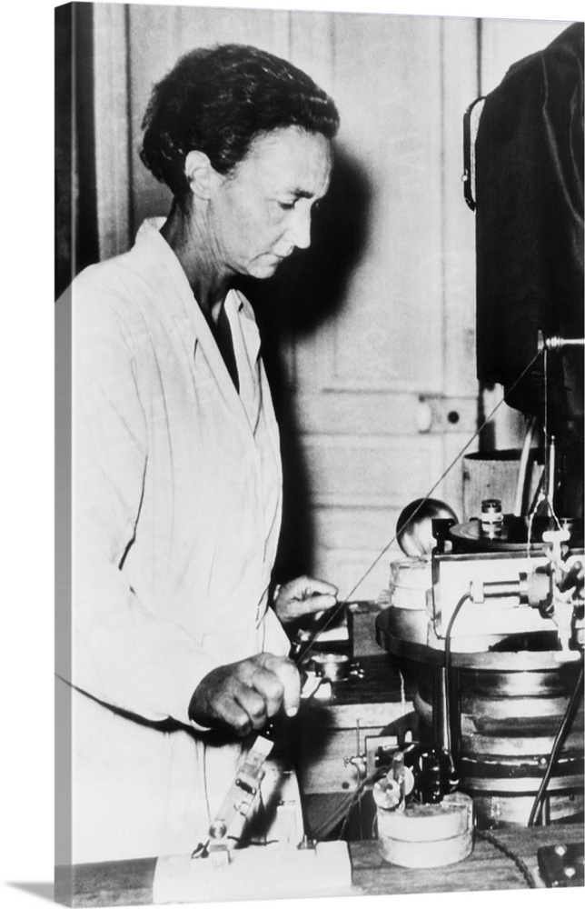 Irene Joliot-Curie, French nuclear physicist and daughter of Marie Curie at work in her lab. c. 1948.