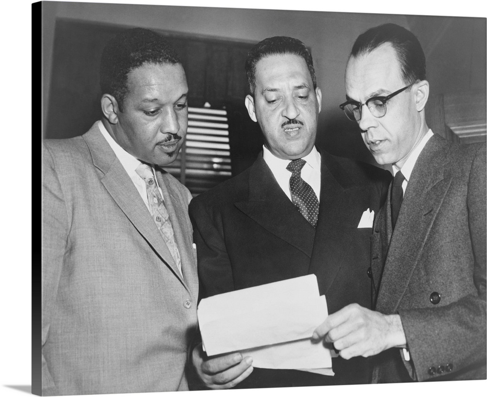 Lawyers confer at the Supreme Court prior to presenting arguments against school segregation. Harold Boulware, Thurgood Ma...