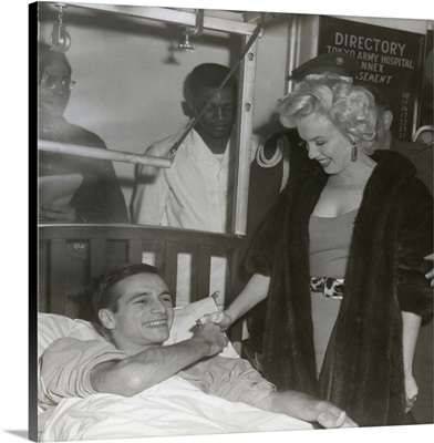 Marilyn Monroe Visiting Wounded Soldier In Hospital In Japan.