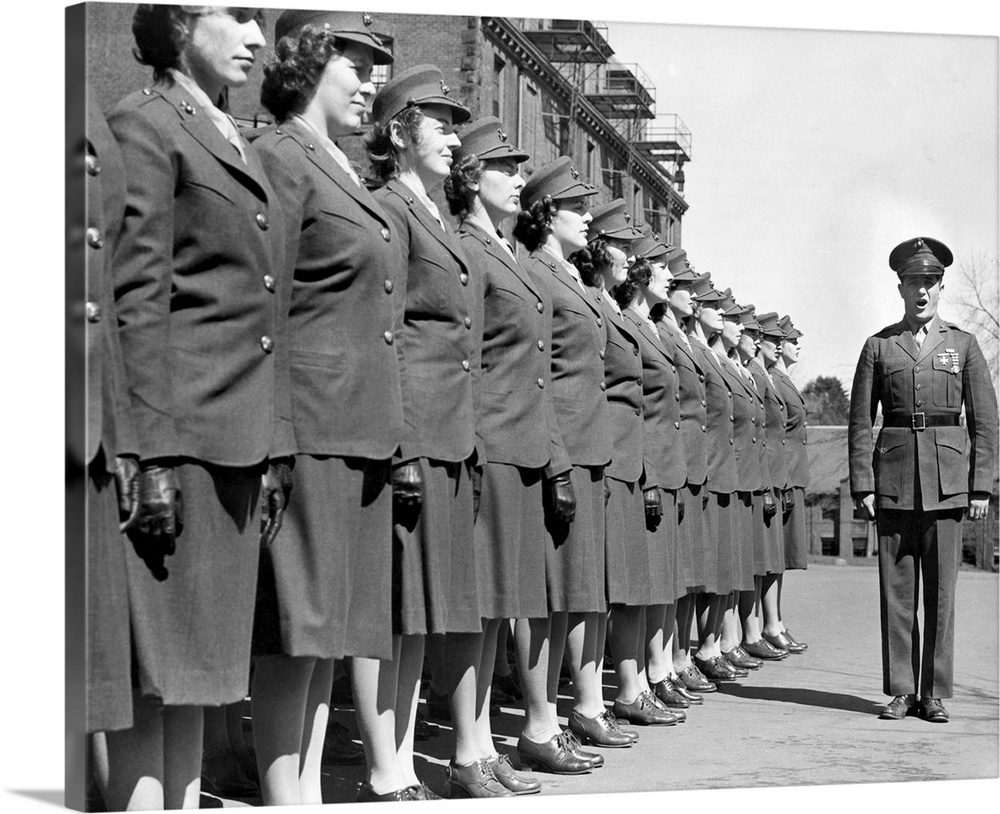 Drill Instructor with uniformed recruits at Marine Corps Women's Reserve Officer's Candidate School. Ca.1945.