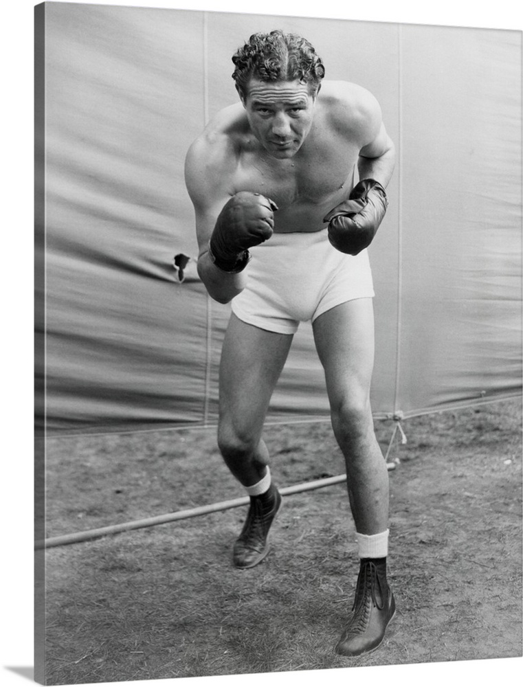Max Baer, former World Heavyweight Champion at his training camp in Speculator, NY. He was getting into shape for a Yankee...