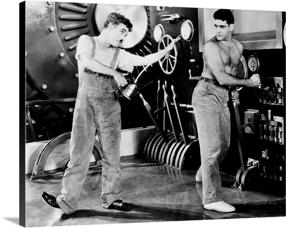 MODERN TIMES, Charlie Chaplin, (left), 1936.