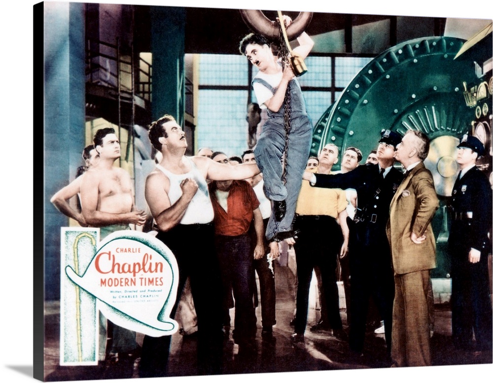 MODERN TIMES, Tiny Sandford (second left), Charlie Chaplin (center), 1936.