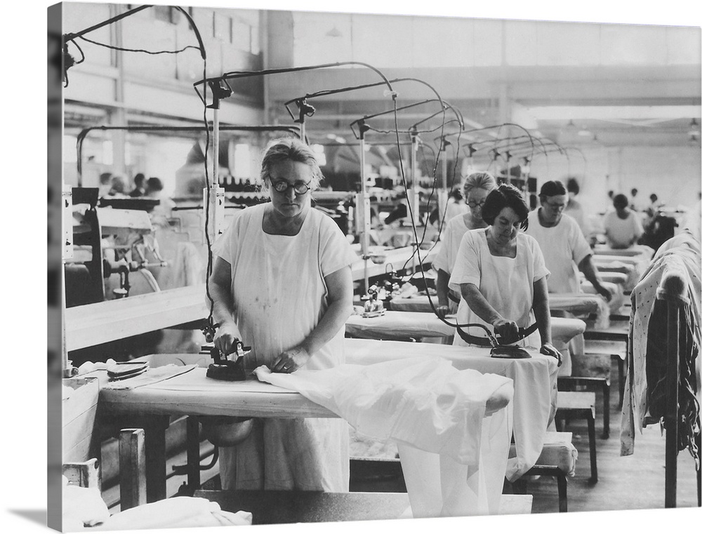Older women doing hand ironing in a laundry, c. 1925-35.