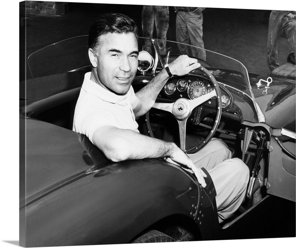 Porfirio Rubirosa at the wheel of his Italian race car, a $17,000 Ferrari Mondial. Cleveland Press photo by Lester Nehamki...