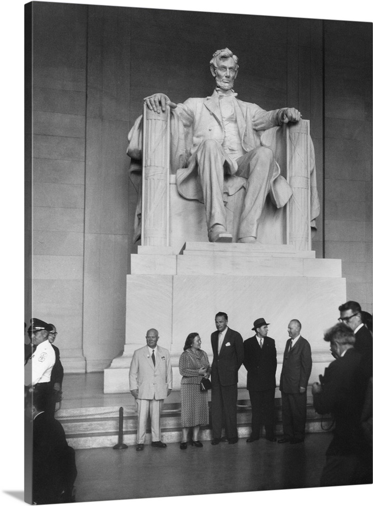Premier Nikita Khrushchev and others beneath the Lincoln statue in the Lincoln Memorial. L-R: Nikita and Nina Khrushchev, ...