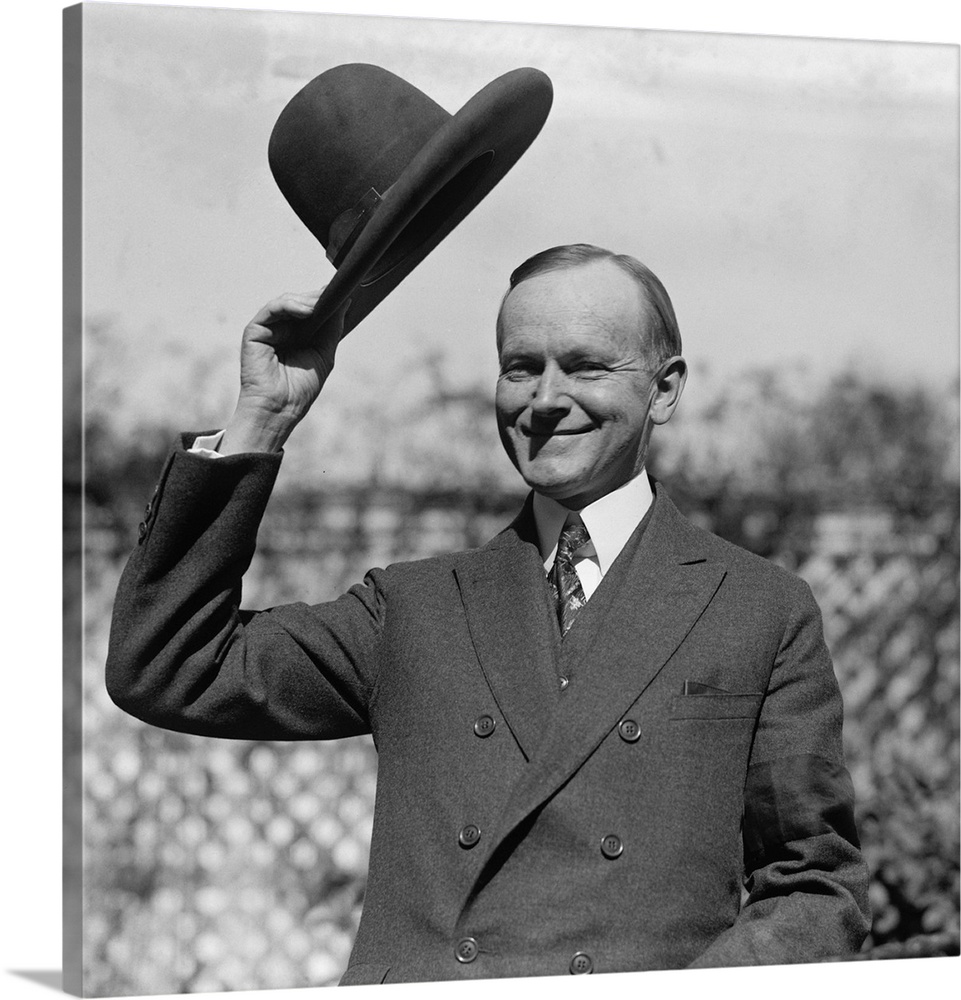 President Calvin Coolidge waves a hat presented to him by Smoki People of Prescott, Arizona. c. Sept-Oct. 1924.