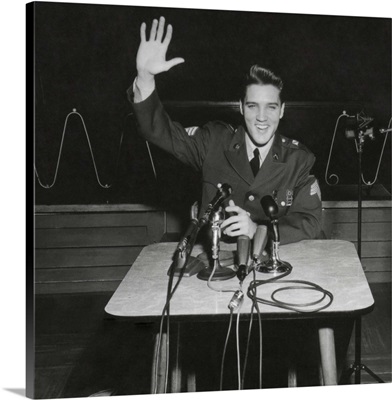 Sgt. Elvis Presley answers question for the civilian and military press, March 1, 1960