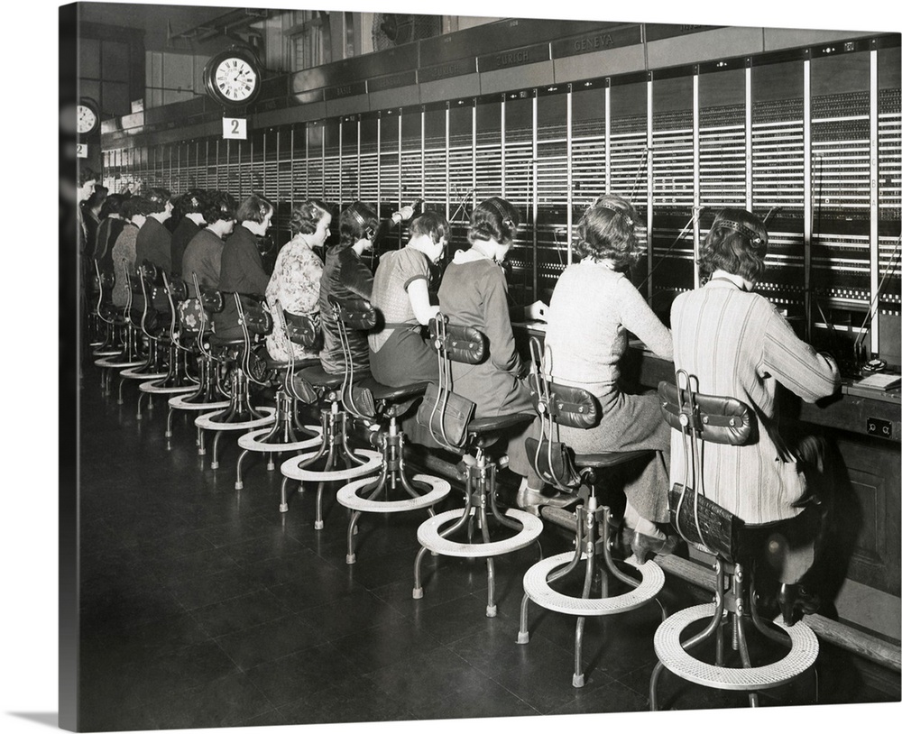 Telephone operators working on an international switchboard in the 1930s.