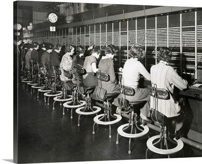 Telephone operators working on an international switchboard in the 1930s