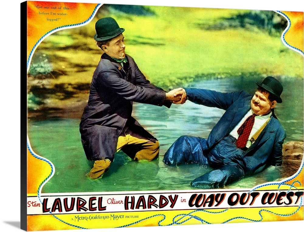 WAY OUT WEST, Stan Laurel, Oliver Hardy, 1937, pulling out of the water.