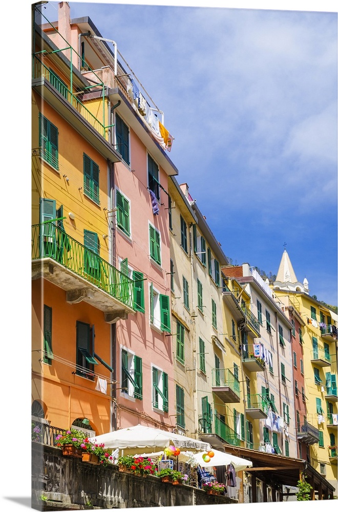 Narrow street and colorful houses in Riomaggiore, Cinque Terre, Liguria, Italy