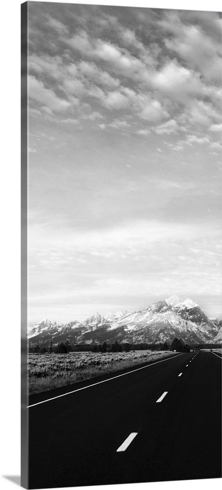 One photo in a series of three taken on  a road to Grand Teton.