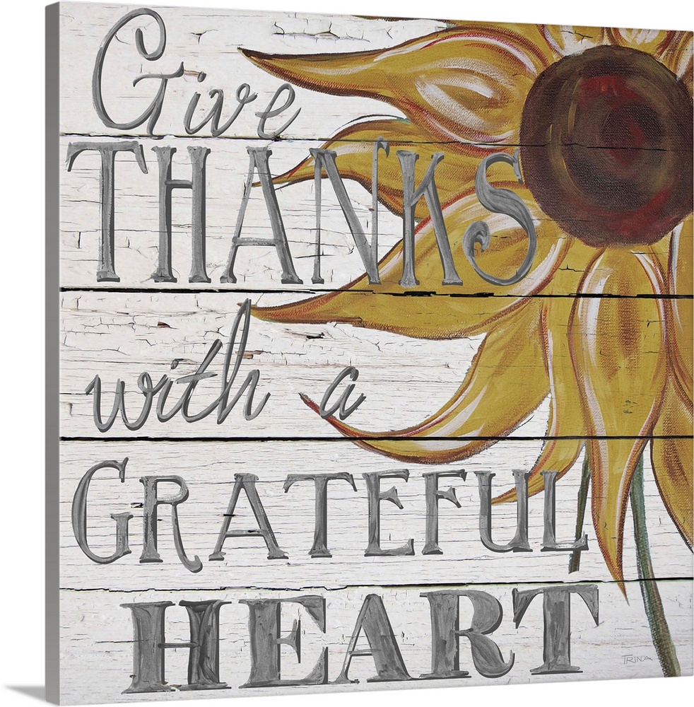 "Give thanks with a grateful heart" handwritten on white shiplap background and sunflower.
