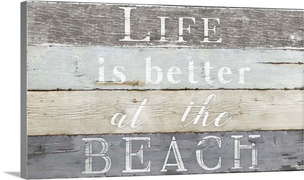 Decorative artwork with the text "Life is Better at The Beach" against a wood plank backdrop.