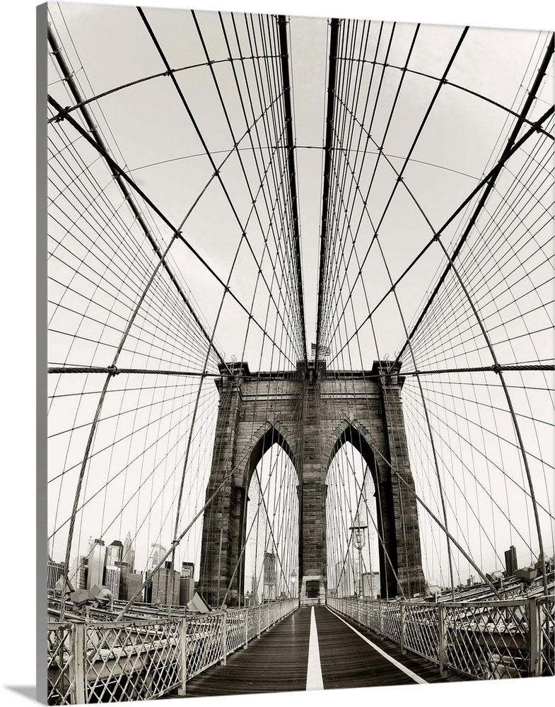 Symmetric abstract photograph of the Brooklyn Bridge with a vintage color to it.