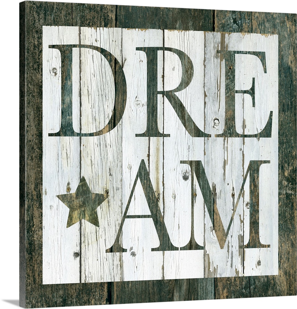 Decorative artwork of a white square and the word 'Dream' in it against of rustic wood background.