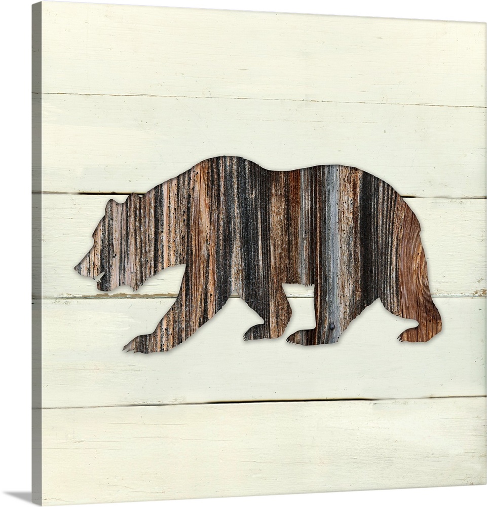 Square decor of a dark brown wooden silhouette of a bear on a white wooden plant background.