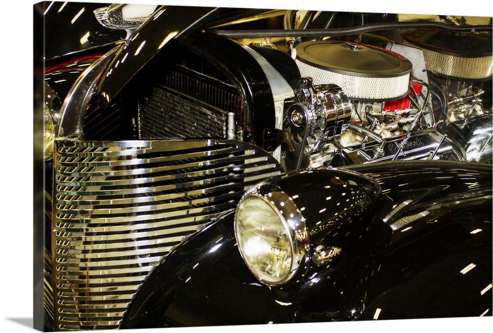 Fine art photograph of the engine and grill of a vintage car.