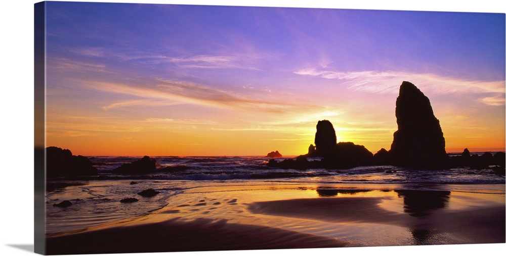 Sunset over the sea stacks at Cannon Beach, Oregon.