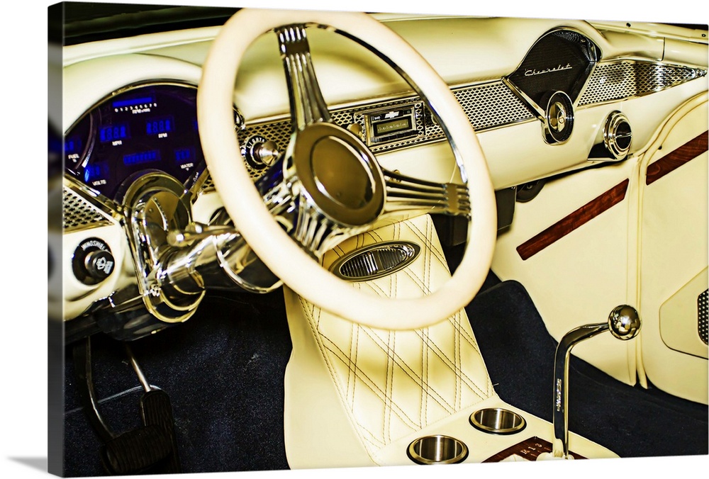 Fine art photograph of the white leather dashboard and console of a vintage car.