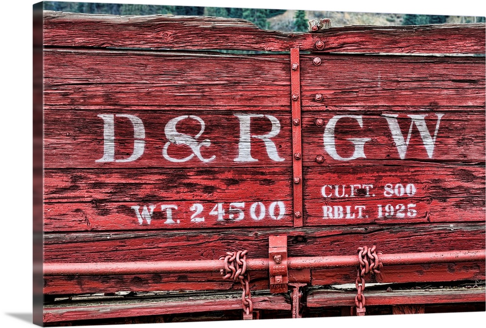 Close up photo of detail and lettering from a vintage train car.