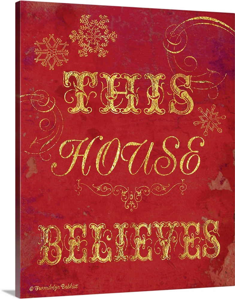 Holiday decor in red and gold that reads "This House Believes"