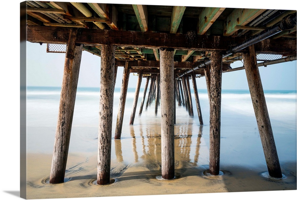 Photograph looking under the Imperial Beach pier, California.