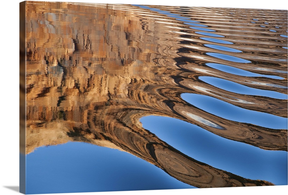 USA; Utah; Glen Canyon National Recreation Area; Lake Powell; colorful patterns in water made by a boat wake