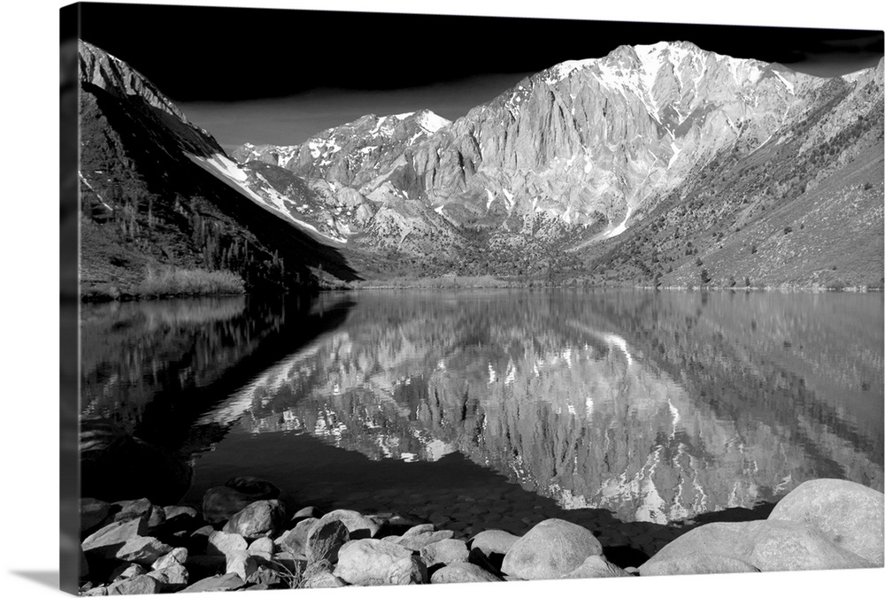 Black and white landscape photograph of Laurel Mountain peak reflecting into a lake in the foreground.